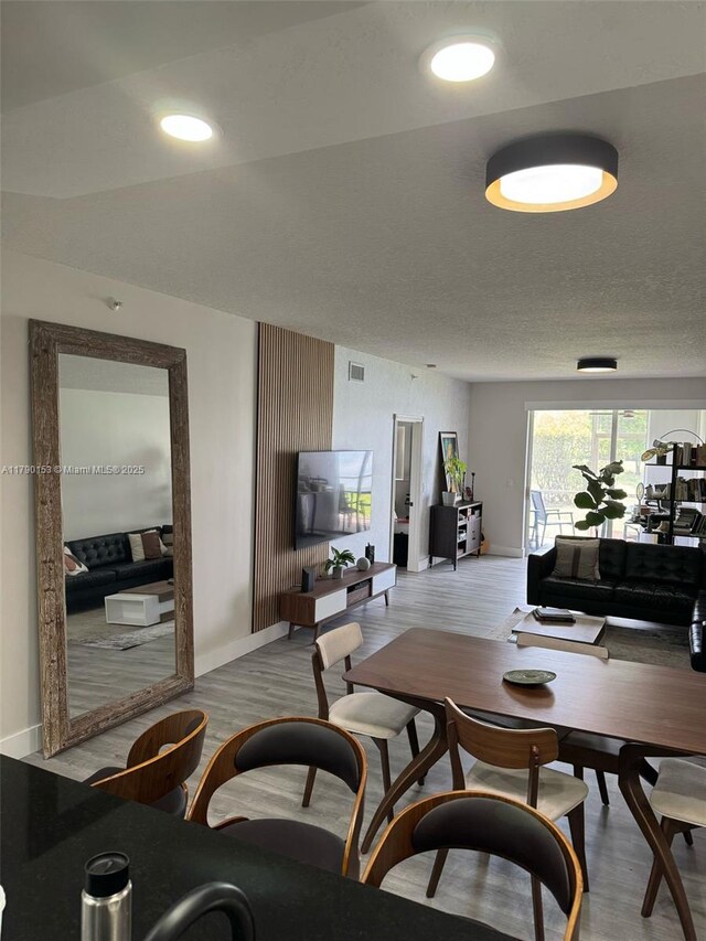 10730 NW 66 Unit 101, Doral, FL 33178 - living area with baseboards and wood finished floors