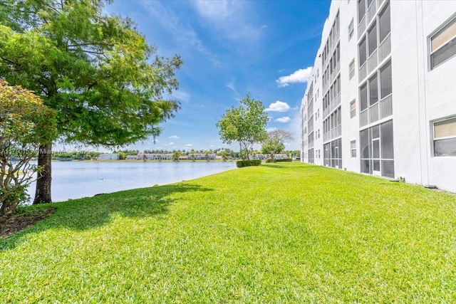 10730 NW 66 Unit 101, Doral, FL 33178 - view of grassy yard with a water view