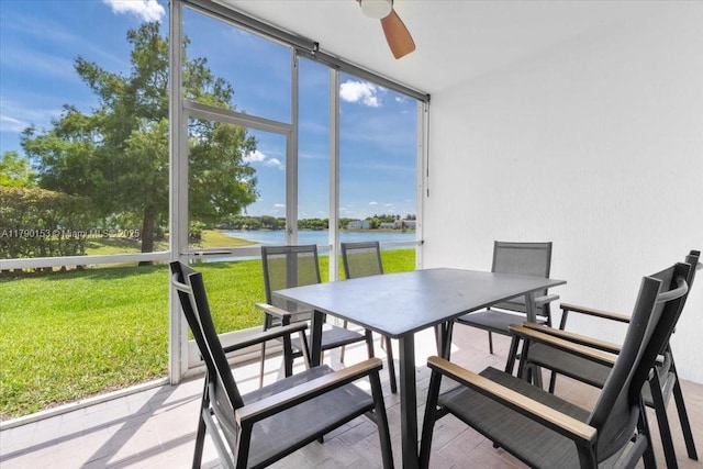 10730 NW 66 Unit 101, Doral, FL 33178 - sunroom with a water view, outdoor dining area, and a ceiling fan