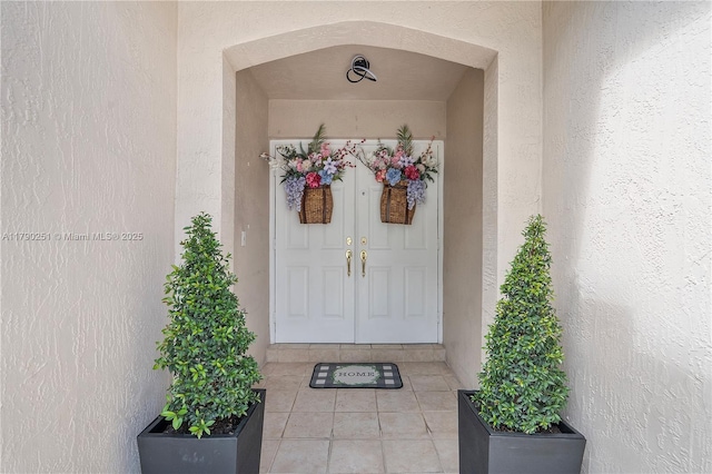 13995 S Cypress Cove Cir, Davie, FL 33325 - doorway to property featuring stucco siding
