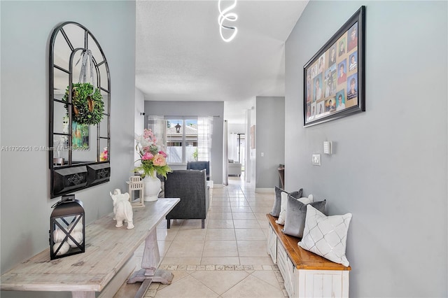13995 S Cypress Cove Cir, Davie, FL 33325 - hallway with light tile patterned floors and baseboards