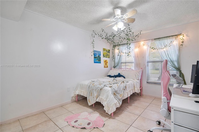 13995 S Cypress Cove Cir, Davie, FL 33325 - bedroom with a textured ceiling, light tile patterned flooring, and ceiling fan