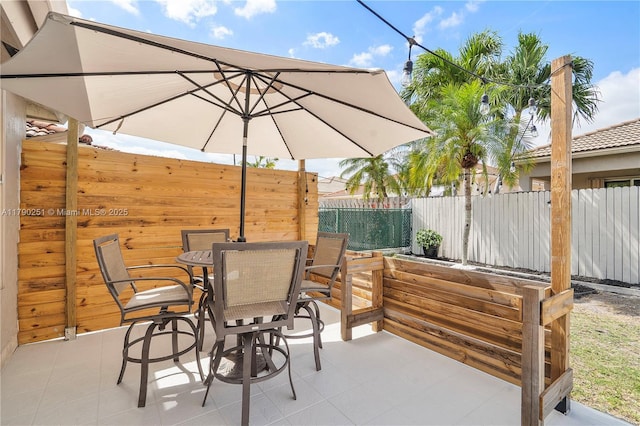 13995 S Cypress Cove Cir, Davie, FL 33325 - view of patio featuring outdoor dining area