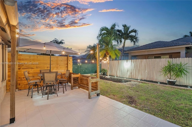 13995 S Cypress Cove Cir, Davie, FL 33325 - fenced backyard featuring a patio and outdoor dining area