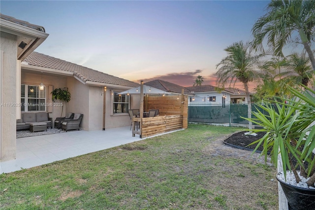 13995 S Cypress Cove Cir, Davie, FL 33325 - yard at dusk featuring outdoor lounge area and a patio area