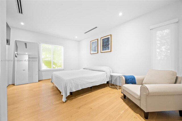 288 NE 117th St, Miami, FL 33161 - bedroom with recessed lighting and light wood finished floors