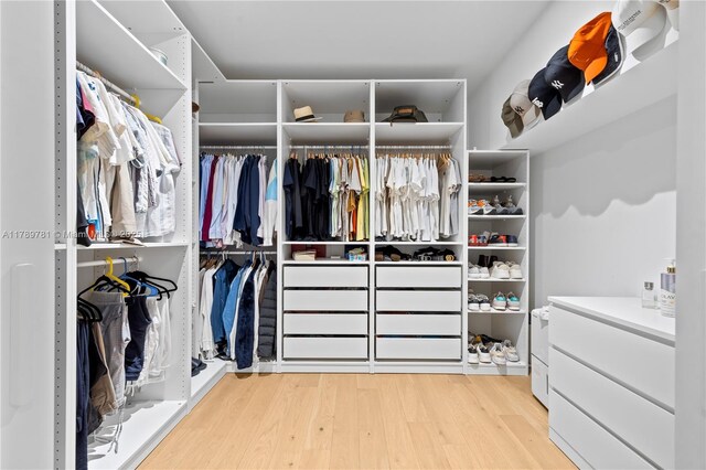 288 NE 117th St, Miami, FL 33161 - walk in closet featuring wood finished floors