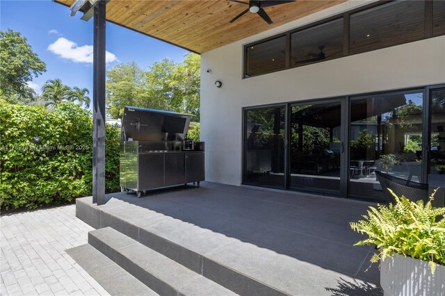 288 NE 117th St, Miami, FL 33161 - view of patio featuring ceiling fan