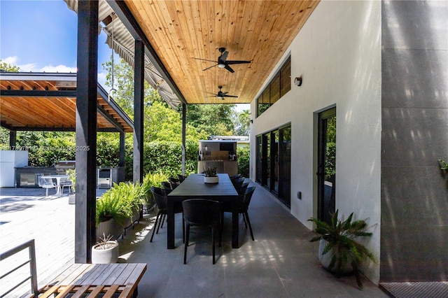 view of patio / terrace with outdoor dining space and a ceiling fan