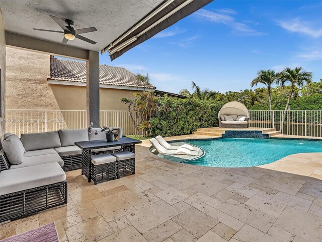 view of pool featuring a fenced in pool, a fenced backyard, outdoor lounge area, ceiling fan, and a patio