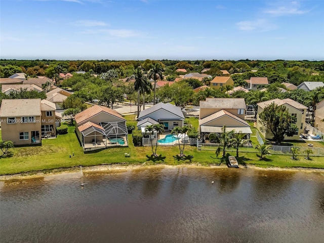 aerial view featuring a water view and a residential view