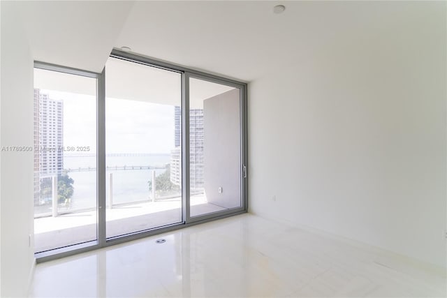 empty room with floor to ceiling windows