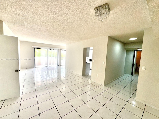 5900 SW 127th Ave Unit 3410, Miami, FL 33183 - unfurnished room with a textured ceiling and light tile patterned floors