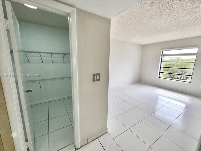 5900 SW 127th Ave Unit 3410, Miami, FL 33183 - bathroom with tile patterned floors and a textured ceiling