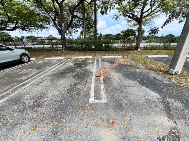 5900 SW 127th Ave Unit 3410, Miami, FL 33183 - uncovered parking lot with fence