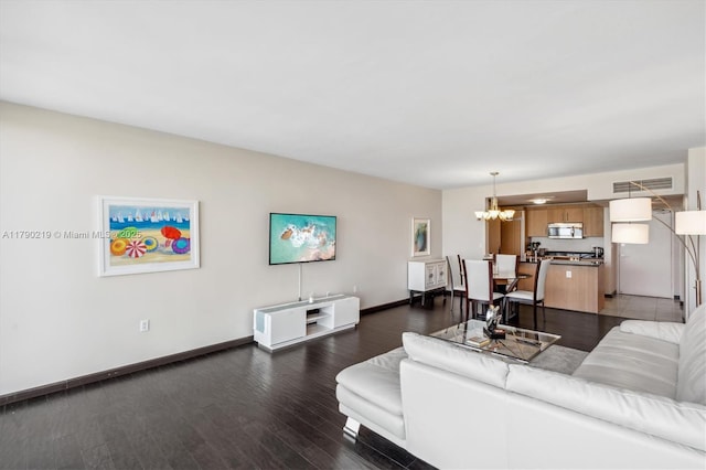 10275 Collins Ave Unit 529, Bal Harbour, FL 33154 - living room with a chandelier, visible vents, dark wood finished floors, and baseboards