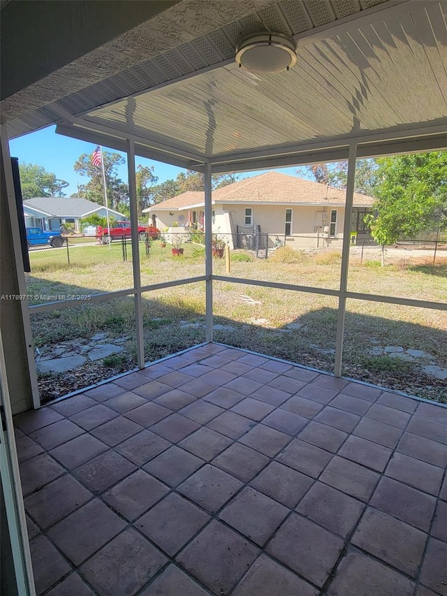 view of patio featuring fence