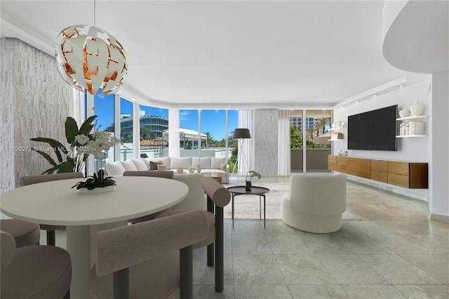 300 S Pointe Dr Unit 405, Miami Beach, FL 33139 - dining room featuring a wall of windows