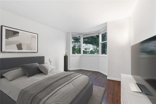 300 S Pointe Dr Unit 405, Miami Beach, FL 33139 - bedroom featuring dark wood-style floors and baseboards