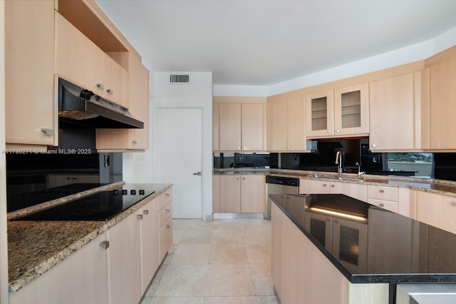 300 S Pointe Dr Unit 405, Miami Beach, FL 33139 - kitchen featuring black electric cooktop, stainless steel dishwasher, a sink, dark stone countertops, and under cabinet range hood