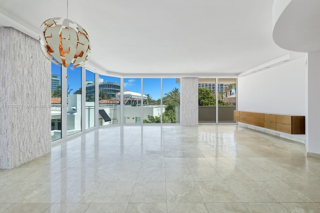 300 S Pointe Dr Unit 405, Miami Beach, FL 33139 - spare room featuring a wall of windows