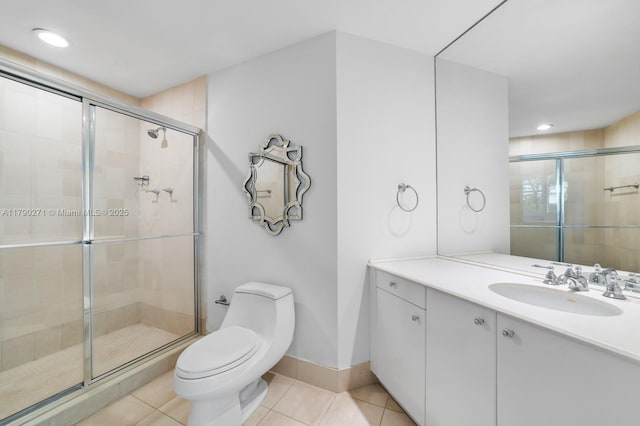 300 S Pointe Dr Unit 405, Miami Beach, FL 33139 - full bath with vanity, toilet, tile patterned flooring, and a stall shower