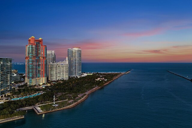 300 S Pointe Dr Unit 405, Miami Beach, FL 33139 - aerial view at dusk featuring a water view