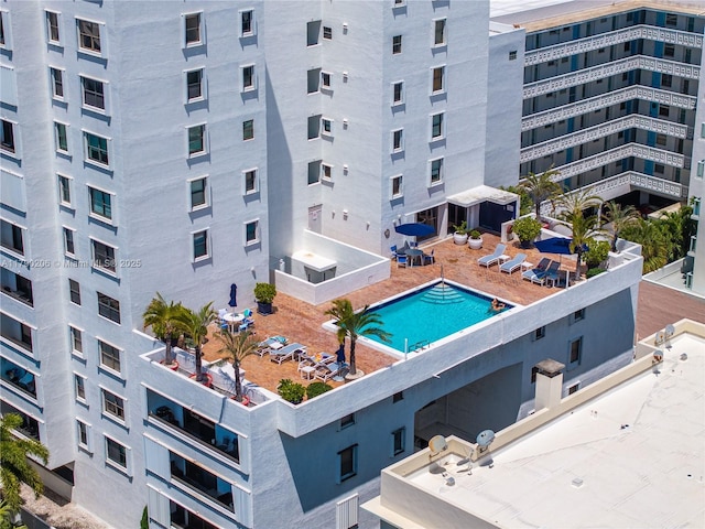 1775 Washington Ave Unit 11C, Miami Beach, FL 33139 - view of subject property with apartment complex / building and a pool