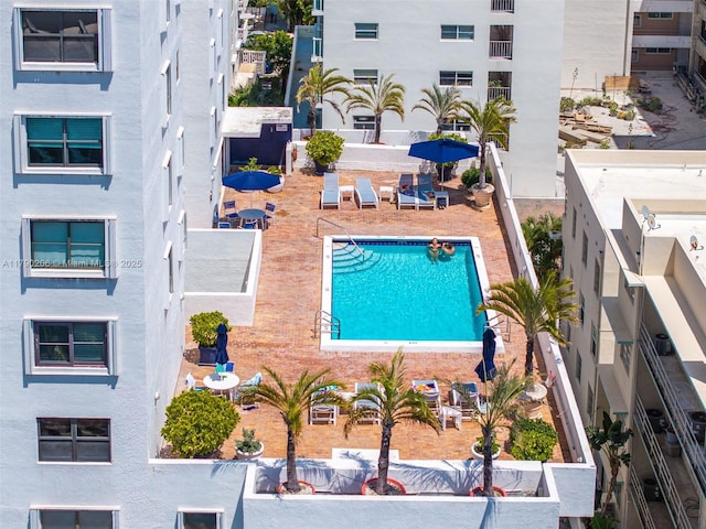 1775 Washington Ave Unit 11C, Miami Beach, FL 33139 - drone / aerial view of a pool area and apartment complex
