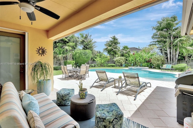 20951 SW 134th Ave, Miami, FL 33177 - view of swimming pool featuring ceiling fan, a patio area, fence, and a pool with connected hot tub
