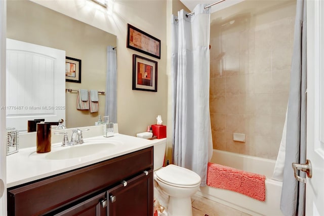 bathroom featuring shower / tub combo with curtain, toilet, and vanity