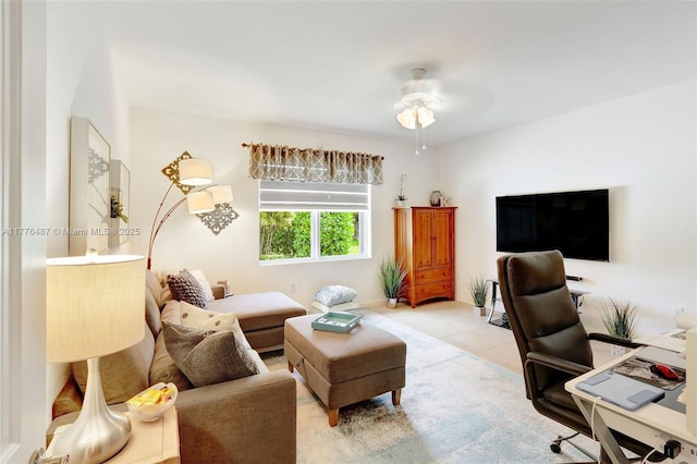 office with a ceiling fan and light tile patterned floors