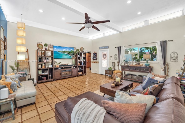 living room featuring light tile patterned floors, a ceiling fan, recessed lighting, and beam ceiling