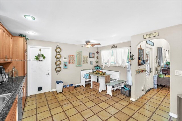 laundry area with independent washer and dryer and cabinet space