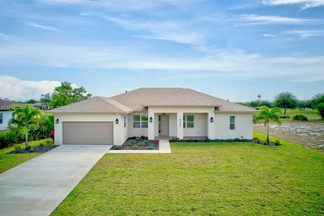 5224 Columbus Blvd, Sebring, FL 33872 - view of front facade with a garage, driveway, a front lawn, stucco siding, and a shingled roof