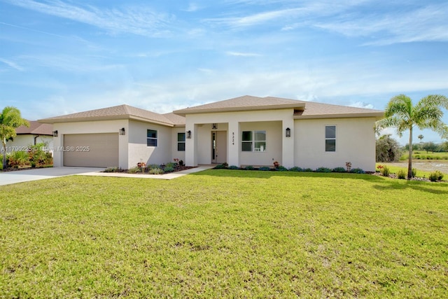 5224 Columbus Blvd, Sebring, FL 33872 - prairie-style house featuring concrete driveway, a garage, stucco siding, and a front lawn