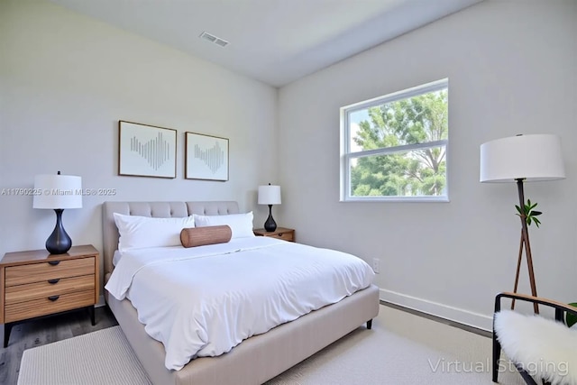 5224 Columbus Blvd, Sebring, FL 33872 - bedroom with wood finished floors and baseboards