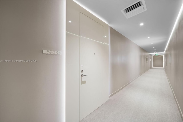1000 Brickell Plz Unit Ph5603, Miami, FL 33131 - hall featuring recessed lighting, light carpet, and baseboards
