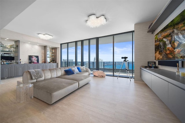 1000 Brickell Plz Unit Ph5603, Miami, FL 33131 - living room with expansive windows and bar