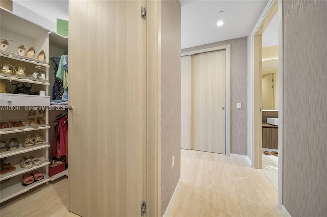 1000 Brickell Plz Unit Ph5603, Miami, FL 33131 - corridor featuring wallpapered walls