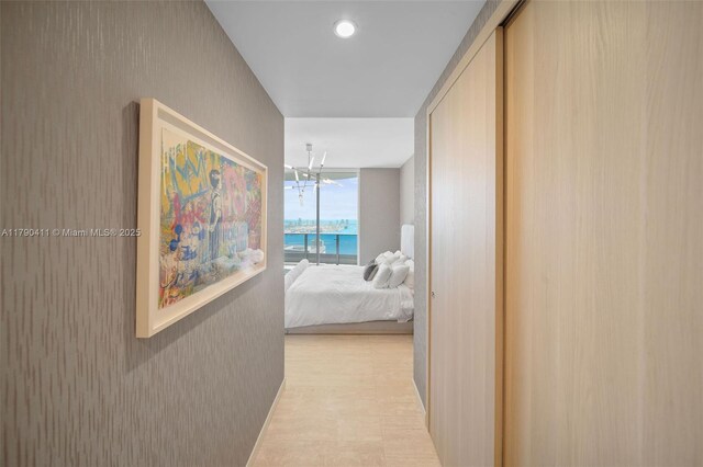 1000 Brickell Plz Unit Ph5603, Miami, FL 33131 - hallway featuring a chandelier