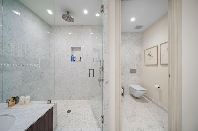 1000 Brickell Plz Unit Ph5603, Miami, FL 33131 - bathroom featuring a shower stall, toilet, recessed lighting, vanity, and tile walls