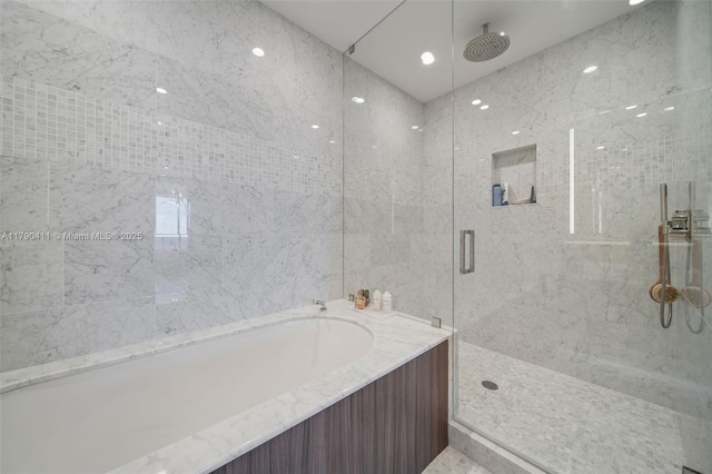 1000 Brickell Plz Unit Ph5603, Miami, FL 33131 - bathroom featuring a marble finish shower and a bath
