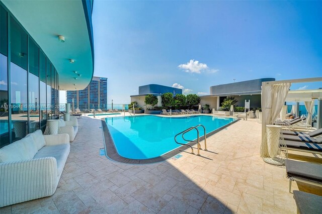 1000 Brickell Plz Unit Ph5603, Miami, FL 33131 - community pool featuring a patio
