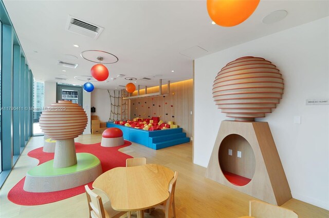 1000 Brickell Plz Unit Ph5603, Miami, FL 33131 - recreation room with wood finished floors and recessed lighting