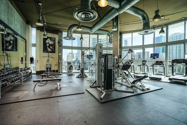 690 SW 1st Ct Unit 2032, Miami, FL 33130 - exercise room featuring a city view and a high ceiling