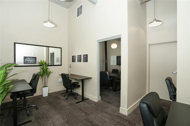 690 SW 1st Ct Unit 2032, Miami, FL 33130 - carpeted home office with a towering ceiling and baseboards