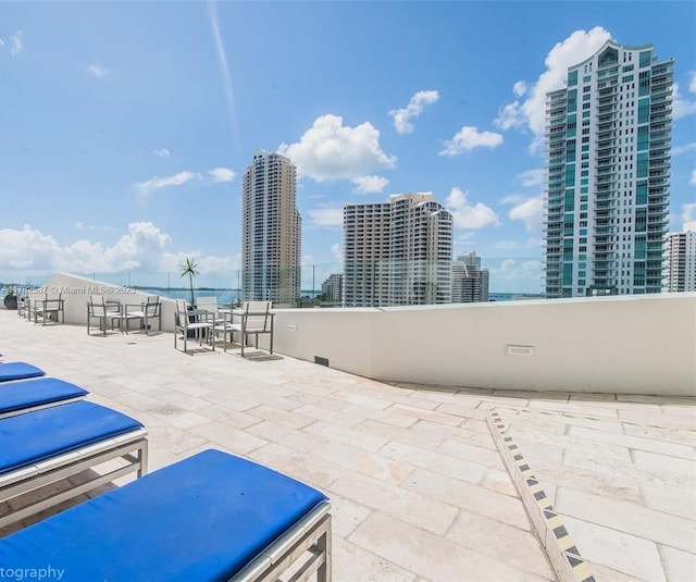 335 S Biscayne Blvd Unit 2003, Miami, FL 33131 - view of patio with a city view