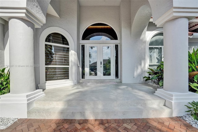 2670 Cypress Ln, Weston, FL 33332 - doorway to property with stucco siding and french doors