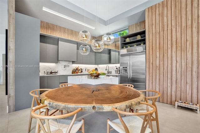 2670 Cypress Ln, Weston, FL 33332 - dining space with finished concrete flooring